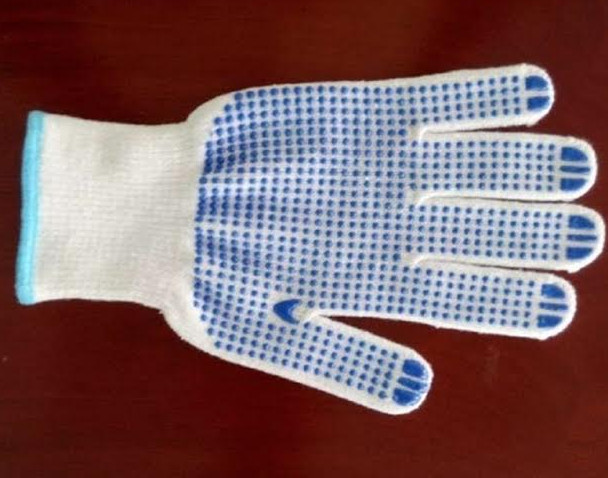 Cotton/polyester blend gloves with PVC dots on palm.